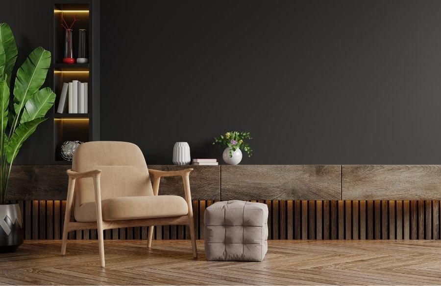 Modern interior design setup featuring a stylish chair, ottoman, and decorative living space.